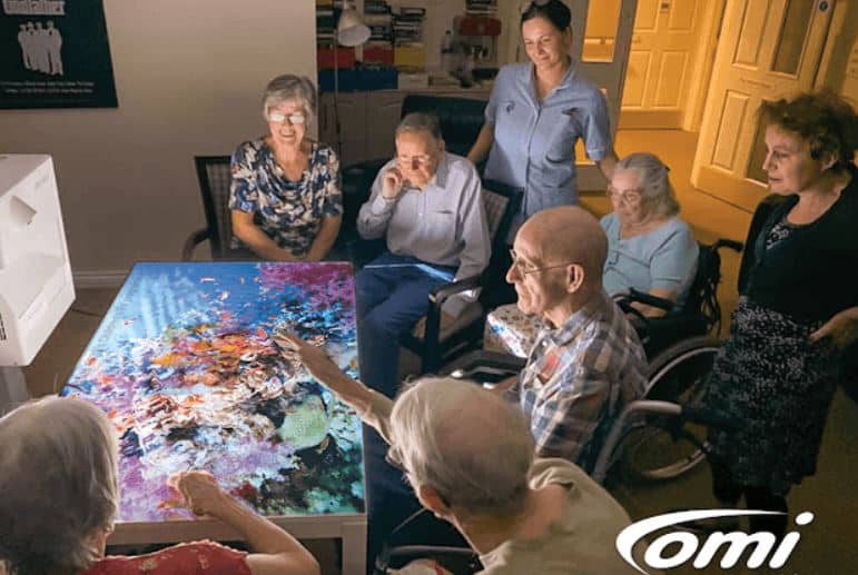 Seniors Enjoying Interactive Projection Technology Games