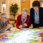 Seniors in Dementia Care Play Interactive Projector Games